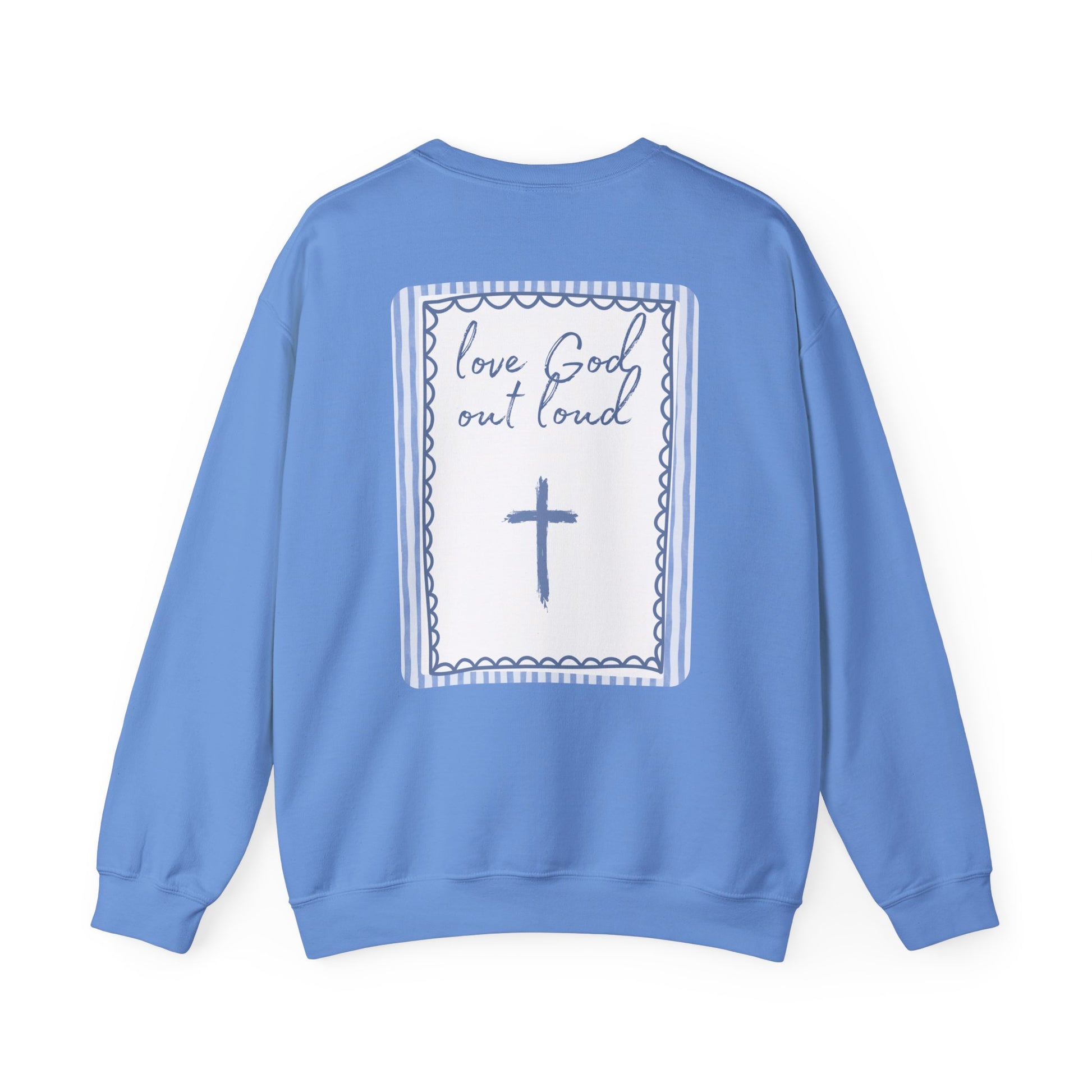 Blue sweatshirt with a cross and text design on the back against a white background